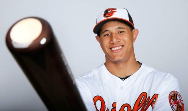 Manny Machado has not played since injuring his knee late last season. (Kevin C. Cox/Getty Images)